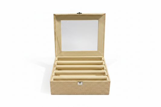 Golden bangle box open with gold border - white background